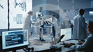 In Robotics Technology Development Laboratory Diverse Team of Engineers Work on a Bionics Exoskele