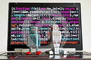Robots with source code screen, artificial intelligence, deep learning concept