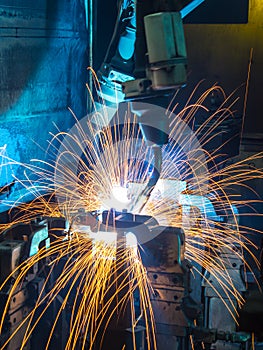 Robots welding automotive parts photo