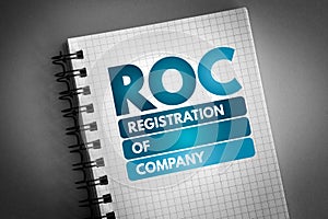 ROC - Registration Of Company acronym on notepad, business concept background