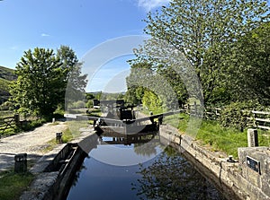 Rochdale canal, with lock gates in, Warland Gate End, Todmorden, UK