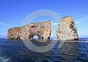 Rocher Perce Rock and Atlantic Ocean on the foreground in Gaspe Peninsula