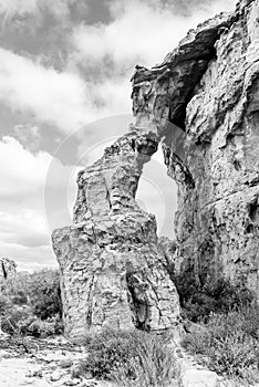 Rock arch at the Stadsaal Caves. Monochrome