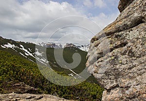 Rock on a background of Carpathians mountains. Ukraine.