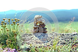 Rock balancing as a shamanism religion symbol in Olkhon island, Russia