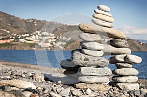 Balancing stone on top of each other photo