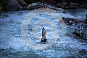 Rock balancing in a stram