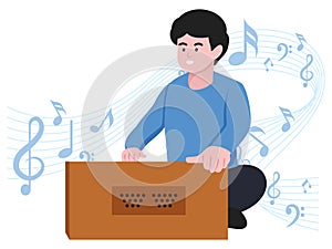 Boy playing Harmonium photo