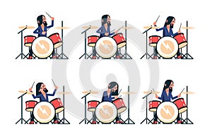 Rock band drummer playing drum set