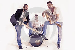 Rock band performing in a studio