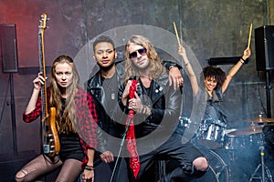 Rock band posing in studio