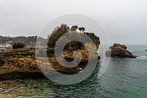 Rock of Basta in Biarritz, France on a gloomy day photo