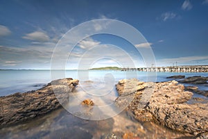 The Rock on the beach and biue sky