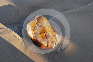 Rock on beach, Crescent Bay, North Laguna Beach, California.