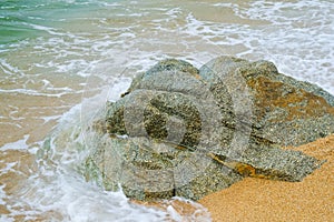 Rock on the beach in Lloret de Mar, Costa Brava, Spain