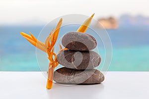 Rock cairn on tropical beach.