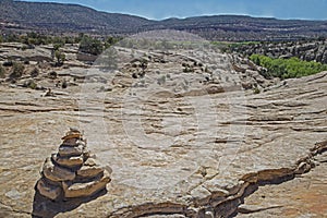 Rock cairns mark hiking trails in Canyon Lands National Park.