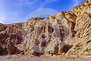 Rock in the canyon with a blue sky on the background