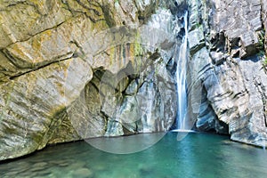 Rock,cascade and pond water