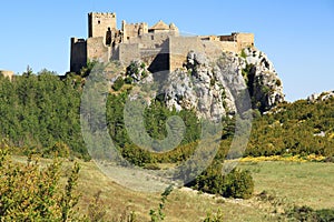 Rock with the Castillo de Loarre close to spanish Pyrenees. photo