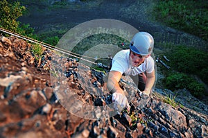 Rock climber ascending