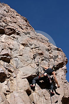 Rock climber ascent