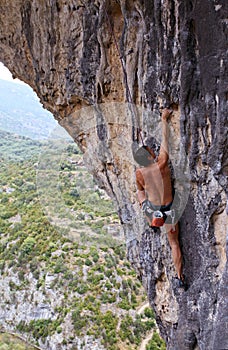 Rock climber on cliff