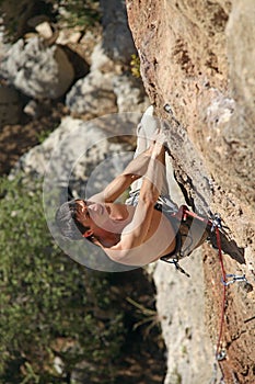 Rock climber on the cliff