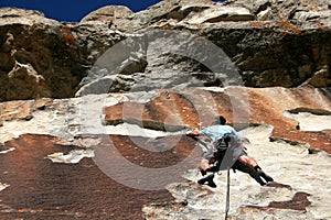 Rock climber on cliff