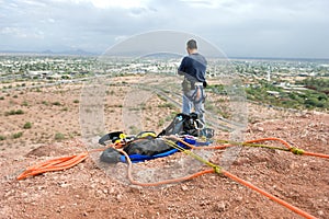 Rock Climber getting ready to rappell