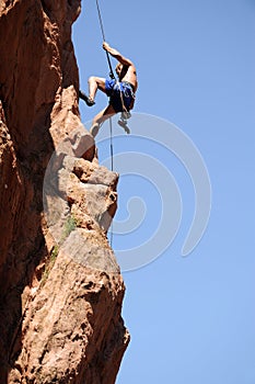 Rock Climber Rappelling