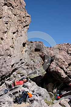 Rock climber resting