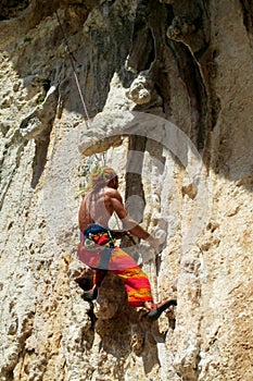 Rock climber with a rope