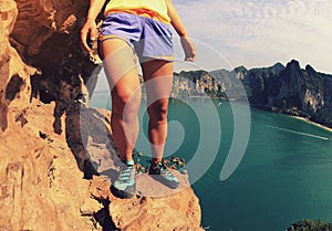 rock climber at seaside mountain rock