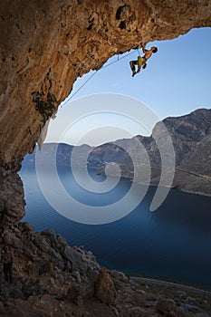 Rock climber at sunset,