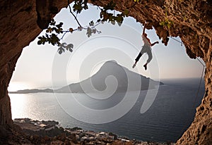 Rock climber at sunset. Kalymnos, Greece.