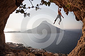 Rock climber at sunset. Kalymnos Island, Greece. photo