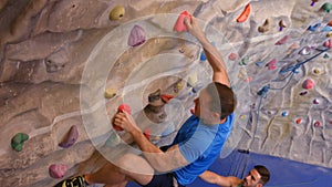 Rock climbers ascending the wall