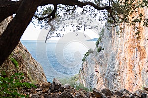 Rock climbers climbing cliff crag, Leonidio, Greece