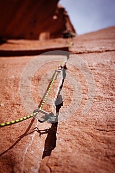 Rock climbing gear in crack