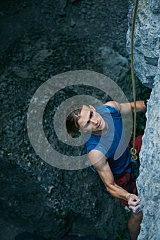 Rock climbing. man rock climber climbing the challenging route on the limestone wall