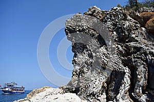 A rock composed of sedimentary rocks with traces of weathering