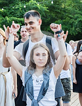 The rock concert was held in Odessa City, Ukraine, an open-air theater called the Green Theater. People on the summer terrace