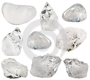 Rock crystal (clear quartz) stone and tumbled gems photo