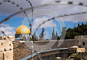 Rock Dome in Jerusalem behind wired fence