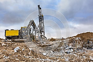 Rock drilling machine to make hole and build a building