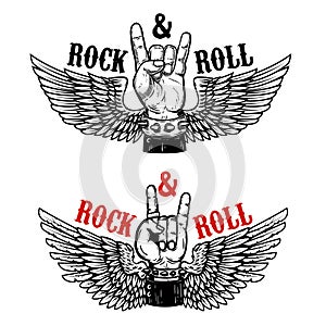 Rock festival. Human hand with rock and roll sign on background with wings. Design element for t-shirt print, poster.