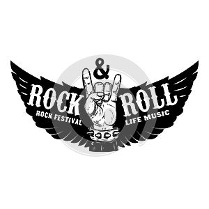 Rock festival. Human hand with rock and roll sign on background with wings. Design element for t-shirt print, poster.