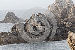 Rock in the fog, at the Pointe de Pern on Ouessant Island in Brittany