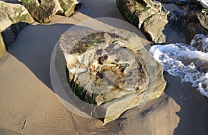 Rock formation along the coastline near Cleo Street Beach in Laguna Beach, California.